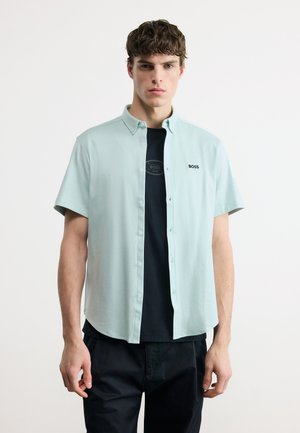 MOTION - Srajca - turquoise aqua