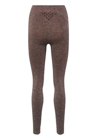 Bruine, rekbare leggings met een gestructureerd driehoekdetail op de tailleband en een gladde afwerking. Getailleerd ontwerp, taps toelopende pijpen.