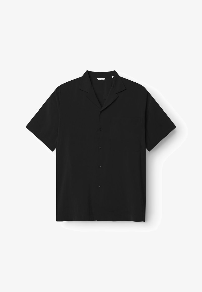 Black short-sleeve shirt with a collared neckline, front buttons, and a single chest pocket. Smooth texture, relaxed fit, plain design.
