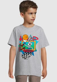 Gray cotton t-shirt featuring a vibrant cartoon print of Bugs Bunny with a basketball. Short sleeves, round neck, and loose fit design.