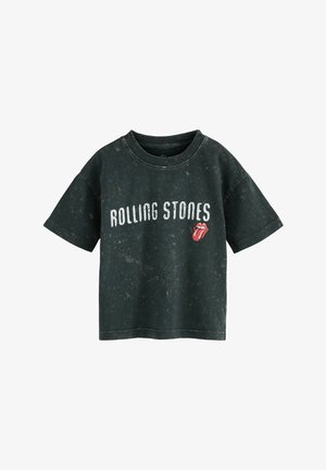 Mørkegrøn, kortærmet t-shirt med "ROLLING STONES" tekst og det ikoniske tunge-logo. Tekstureret stof med et falmet, slidt udseende.