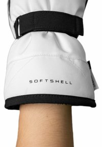 Weißer Softshellhandschuh mit schwarzer Borte und Befestigungsriemen, der eine strukturierte Oberfläche und das Wort "SOFTSHELL" auf dem Bündchen aufgedruckt hat.