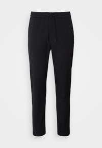 Pantalon noir slim avec taille élastique et cordon, présenté sur un fond clair uni.