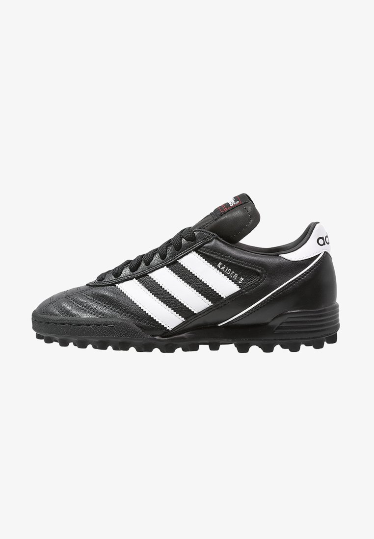 Black synthetic soccer cleat with white three-stripe design, textured upper, lace-up front, and rubber studs for traction. Features padded ankle.