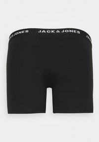 Schwarze Boxer-Brief mit glatter Textur, elastischem Bund mit "JACK & JONES" in Weiß. Einfaches Design, keine zusätzlichen Muster.