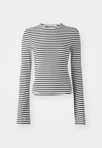 Black and white striped long-sleeve top made of soft fabric; features a round neck and fitted design with a slightly cropped hem.