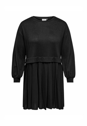 Sort kjole med tætsiddende bodice, lange puffærmer og en flydende nederdel, der når til midt på lægen. Lavet af blødt, letvægtsstof.