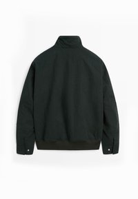 Black bomber jacket made from textured fabric, featuring a high collar, long sleeves, and ribbed waistband with snap button details.