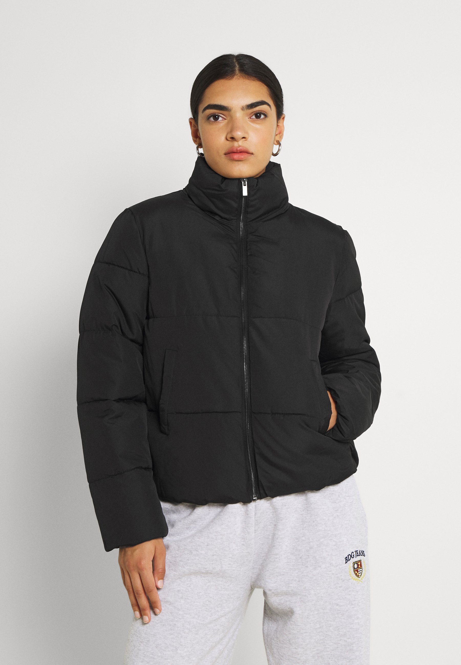 solid black windbreaker
