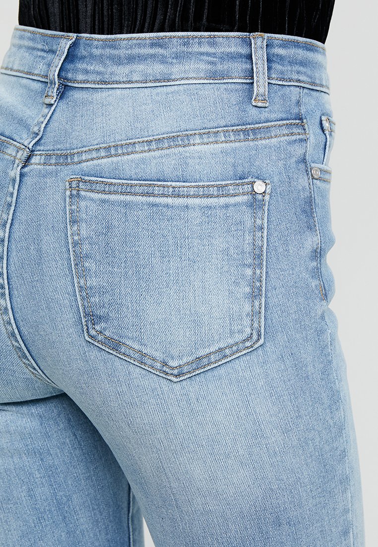 Missguided Petite SINNER HEM SLIT Jeans Skinny Fit Missguided STONEWASH RAW HEM - Jeans Tapered Fit - denim blue