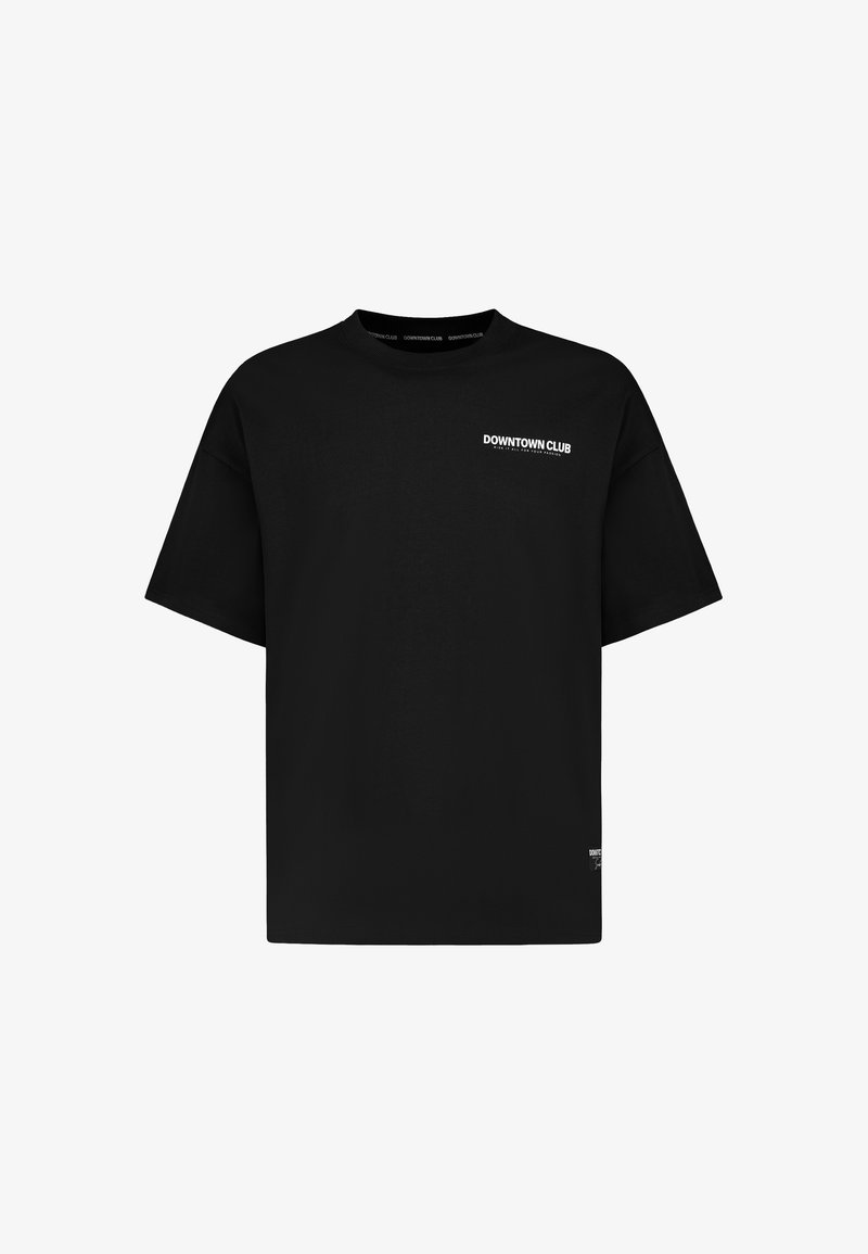 Black oversized T-shirt with short sleeves, featuring small white "DOWNTOWN CLUB" text on the upper left chest and near the bottom hem.