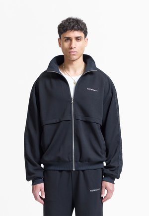 STUDIO REVERSIBLE TRACK - Sweatjacke - black
