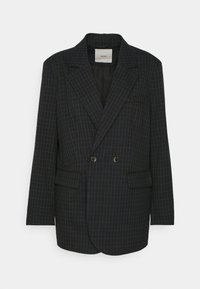 Dvojřadý černý blejzr s modrou kostkou, s klopami a dvěma předními kapsami. Materiál je hladký a má přiléhavý střih.