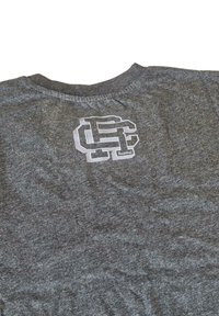 Gray short-sleeve T-shirt with a textured fabric. Features a white logo on the back, reading "SF," with a smooth, reflective finish.