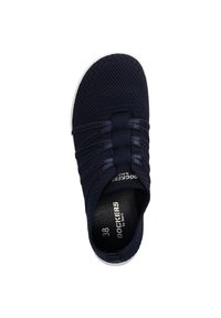 Navy slip-on shoe featuring a textured mesh upper, elastic straps for snug fit, white sole, and interior label indicating size 38.