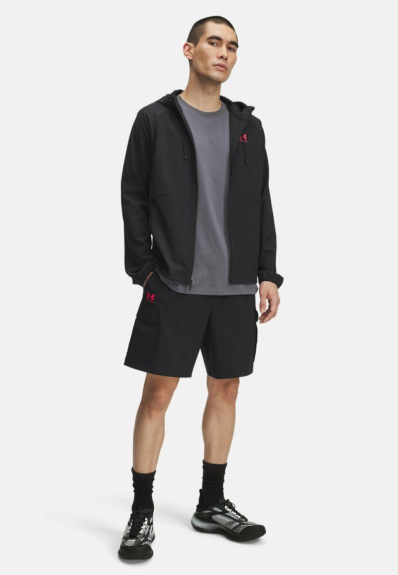 Under Armour VIBE WOVEN Sports shorts black (002)/black - Main Image