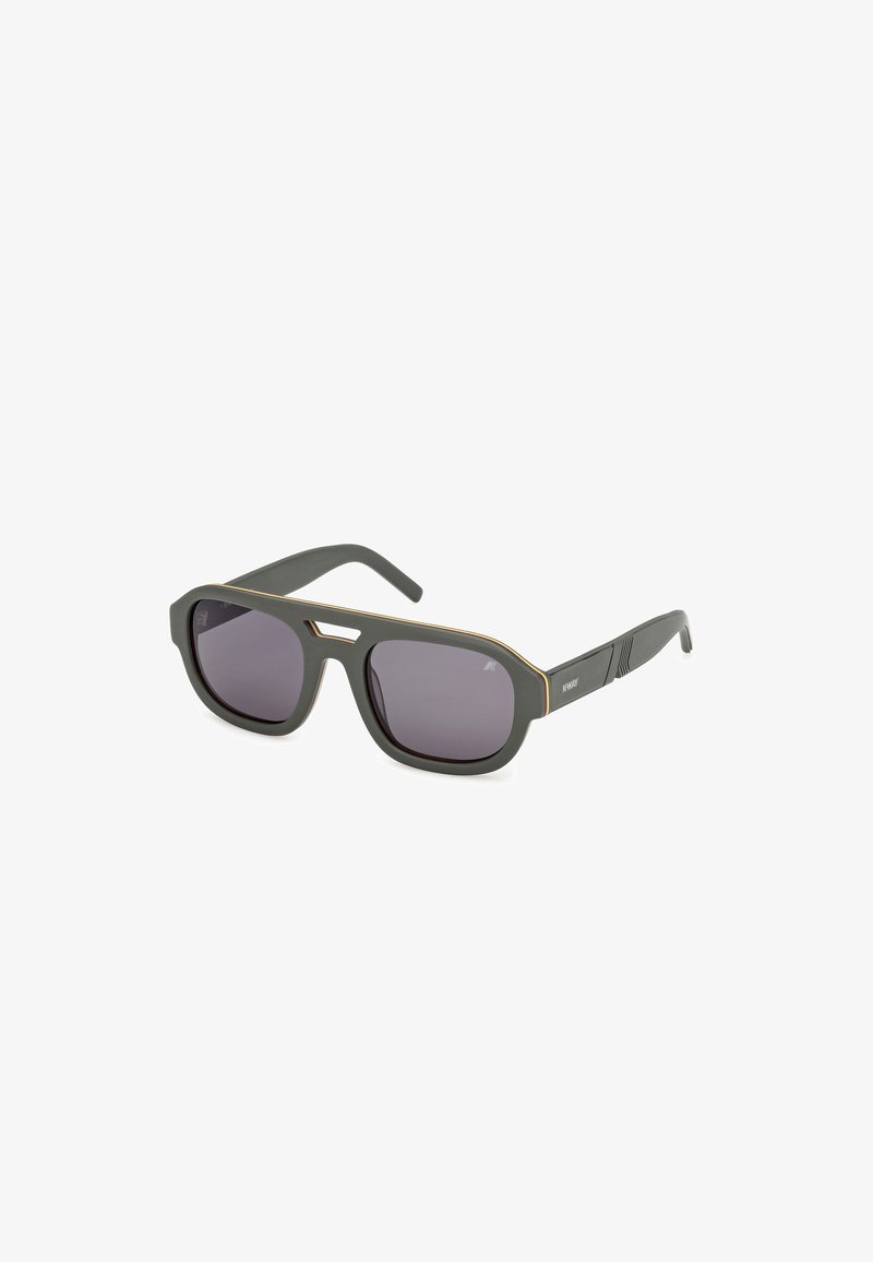 Sunglasses with a matte black frame, oversized rectangular lenses, and subtle gold accents on the arms. Textured side detailing enhances grip.