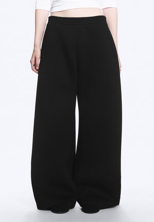 Weekday Pantalones deportivos - black