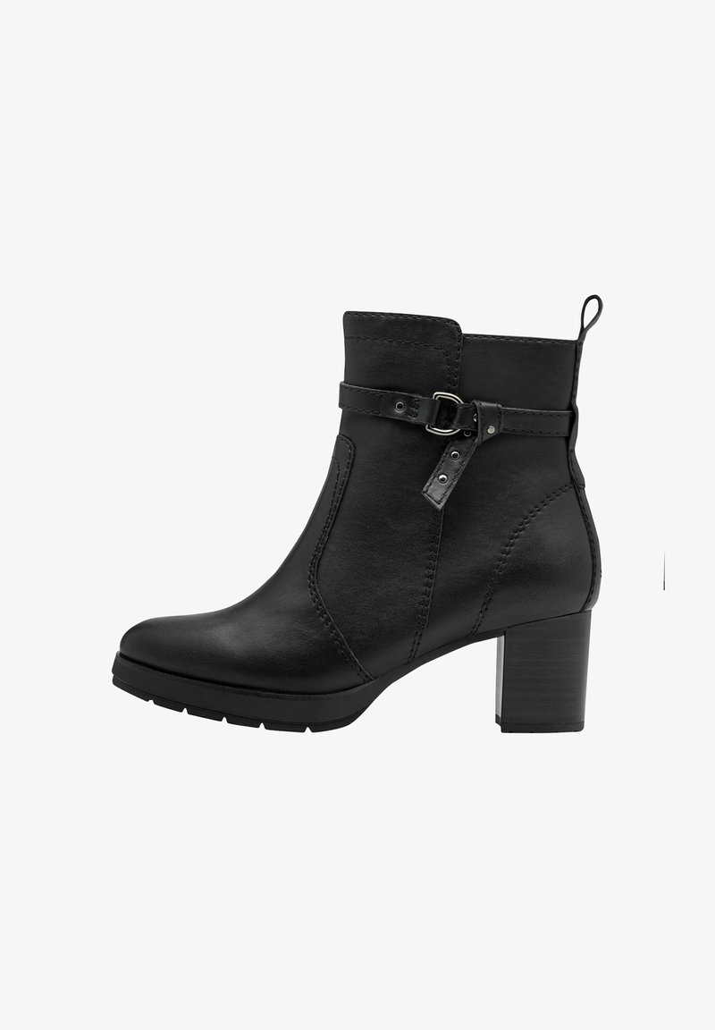 Black leather ankle boot with a block heel, curved design, side stitching, and a decorative strap with a buckle. Textured surface.