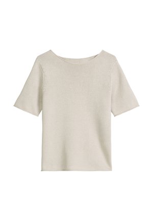 Chemise en tricot beige clair à manches courtes et encolure ronde, présentée à plat sur un fond blanc.