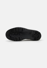 Dr. Martens Botines con plataforma - black