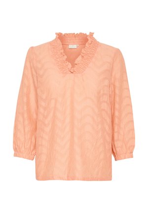 Brzoskwiniowa bluzka z falbaniastym dekoltem w kształcie litery V, długimi rękawami z elastycznymi mankietami oraz teksturowanym wzorem w zygzaki na całej powierzchni.