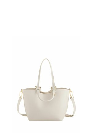 Kremowa skórzana torebka z podwójnymi górnymi uchwytami, odpinanym paskiem na ramię i złotymi detalami.