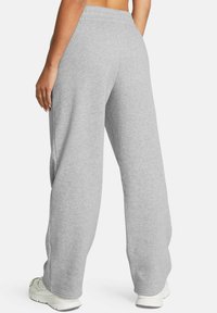 Under Armour RIVAL - Spodnji deli trenirk - mod gray light heather
