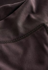 ACTIVE YOGA WRAP - Leggings - chocolate brown
