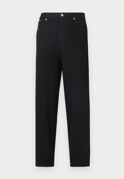 Black denim pants feature a straight cut, visible stitching, and front pockets. The fabric has a smooth texture with a slight sheen.