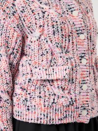 Πλεκτή ζακέτα σε παστέλ ροζ, λιλά και πορτοκαλί αποχρώσεις. Διαθέτει υφή με ανάγλυφο σχέδιο, κούμπωμα με κουμπιά και μπροστινή τσέπη.
