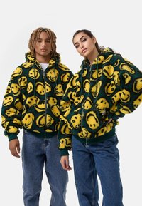 Karl Kani - SIGNATURE SMILEY FULL ZIP UNISEX - Mākslīgās ādas jaka - green/yellow/black Miniatūras attēls 1