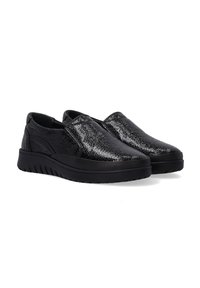 Black slip-on shoes with a textured upper, featuring a shiny, cracked finish. Thick rubber sole with a ridged pattern for traction.