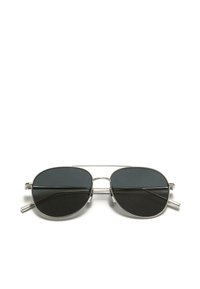 Prillid ovaalsete tumedate läätsedega, hõbedase metallraamiga, kahekordse silla disainiga ja õhukeste varrastega. Minimalistlik ja modernoote esteetika.