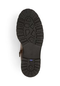Bruine leren laars met een zwarte rubberen zool. Het loopvlak heeft hoekige patronen voor grip. Maat aangeduid als 37. Ritsdetail zichtbaar aan de zijkant.
