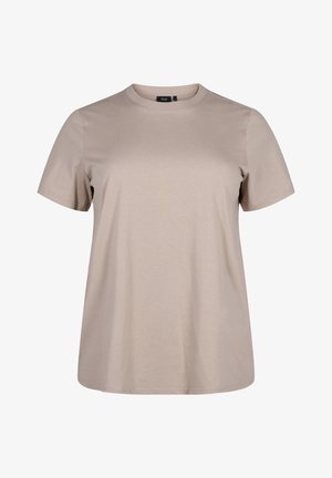 Bēša īsu piedurkņu t-krekls, izgatavots no mīkstas auduma. Klasiska apaļa kakla izgriezums, brīvs piegriezums un minimāla apdare. Gluda tekstūra bez rakstiem.