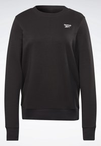 Sweatshirt noir à manches longues avec col rond, présentant des poignets et un ourlet côtelés, avec un petit logo Reebok blanc sur le haut à gauche de la poitrine.