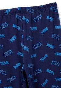 Navy leggings featuring a repeating blue "MARVEL" logo pattern. The fabric is soft with an elastic waistband for comfort.