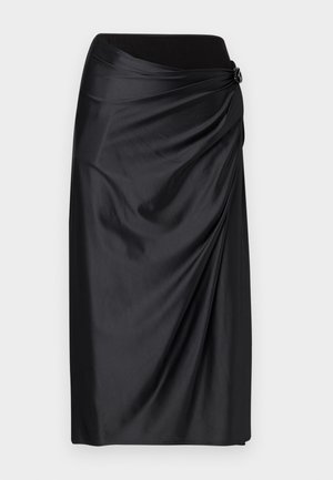 Black satin skirt featuring a draped design, elastic waistband, and a decorative accent. Smooth texture with subtle sheen.