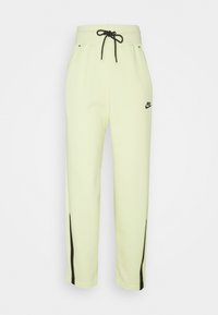 Light green sweatpants featuring a drawstring waist, black detailing along the sides, and a small black logo at the hip.