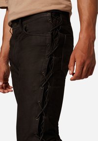 Ricano Leren broek - braun