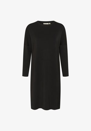 Črna obleka iz mehkega blaga, z okroglim izrezom in tremi četrtinami rokavov. Oblikovanje je ravno krojeno s stranskimi razpoki.