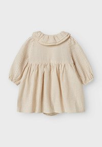 Lys beige kjole med røde lodrette striber, flæset krave, lange puffærmer og indsamlet talje. Lavet af blødt tekstilmateriale.