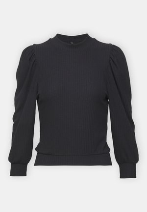 Fekete bordázott kötött pulóver magas nyakkal, puffos hosszú ujjal és szegélyezett mandzsettával. Az anyag sima tapintású és passzos formájú.