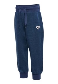 Marinblå barnbyxor i sweatpantsmodell med elastisk midja, dragsko, muddar vid anklarna och en liten vit logotyp på vänster lår.