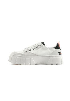 White sneaker with a chunky rubber sole, smooth upper, black accents on the heel, and red pull tab. Features rounded toe and lace closure.