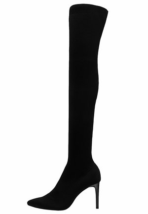 Zwarte kniekouslaarzen met een aansluitende gebreide schacht, spits toelopende neus en een stilettohak, voorzien van een geribbelde boord aan de bovenkant.