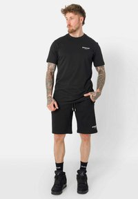 Sixth June ESSENTIEL - Pantalones deportivos - black