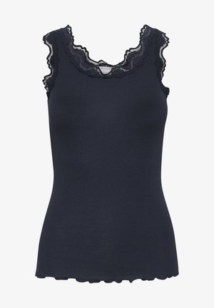 Marinblå linne med spetsdetaljer och vågiga kanter, tillverkat av ribbat tyg, med en figurnära design och ärmlös skärning.