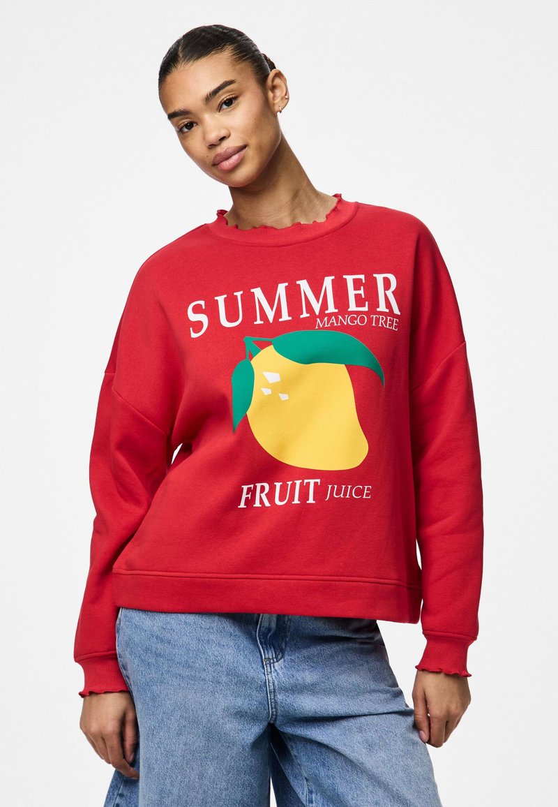 Sudadera roja de algodón con un ajuste relajado, que presenta un gráfico de un mango amarillo y un texto que dice "JUGO DE FRUTA DEL ÁRBOL DE MANGO DE VERANO".